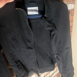 Aritzia's Sunday Best limited edition black Lourdes